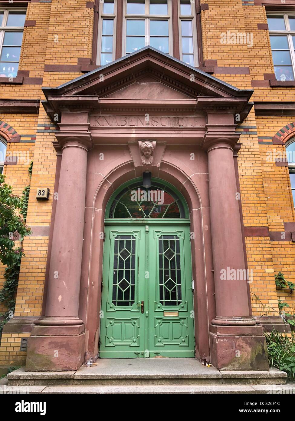 Former boys school entrance in Hamburg, Northern Germany. Stock Photo