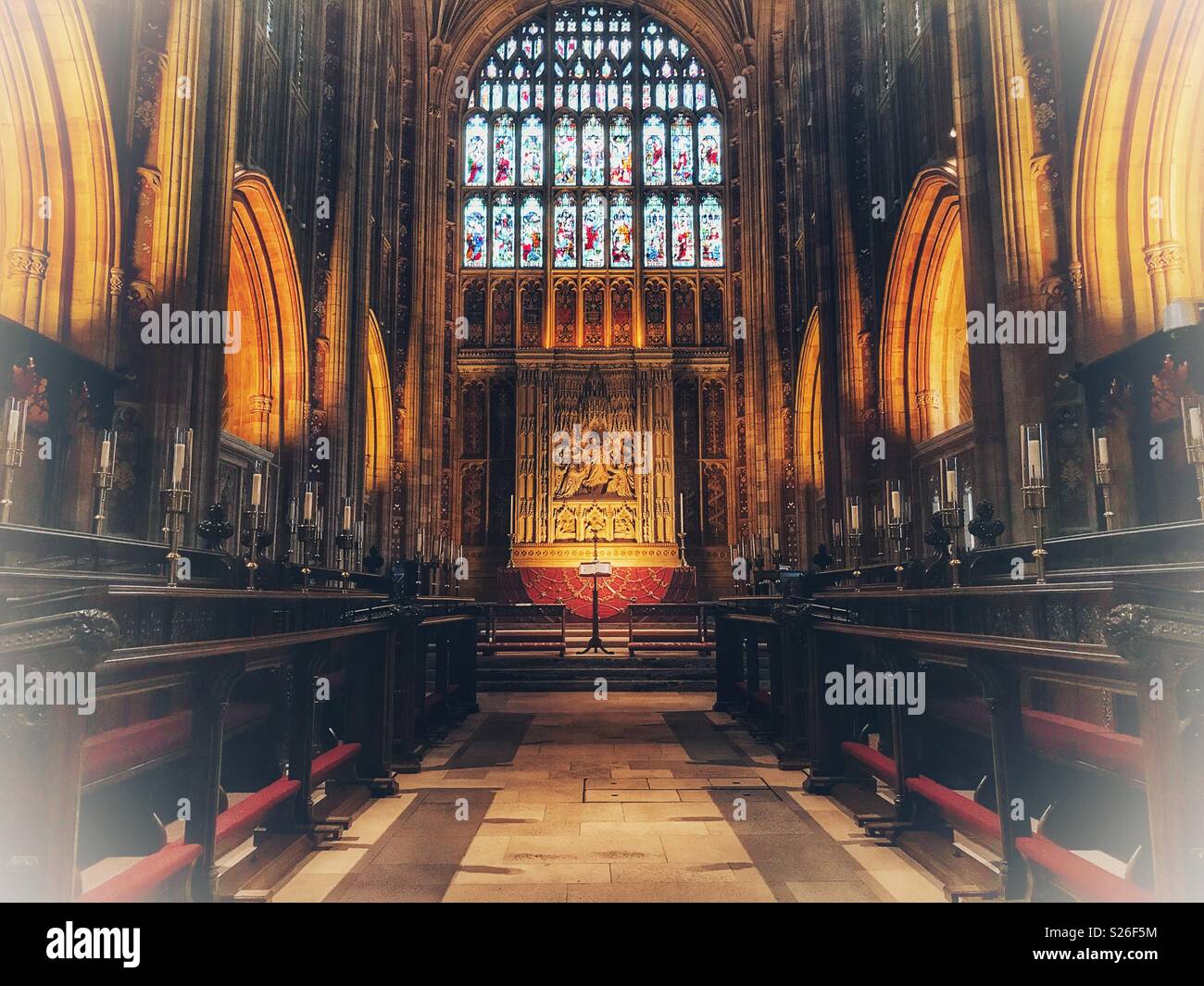 Altar, choir stalls, stained glass window, in the magnificent Sherborne Abbey, Sherborne, Dorset, England Stock Photo