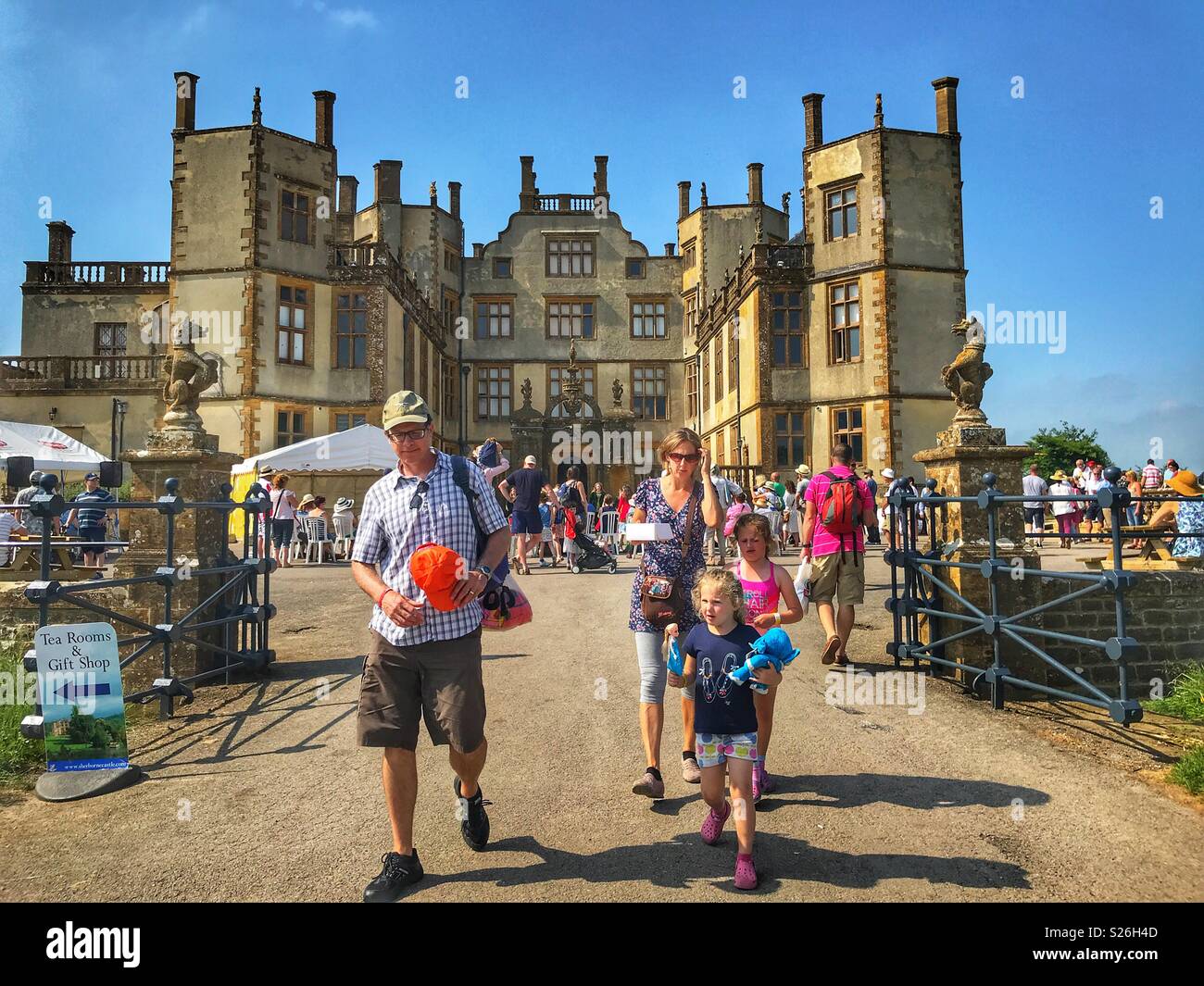 Family group enjoying a day out at the annual Sherborne Castle Country Fair, Sherborne, Dorset, England Stock Photo