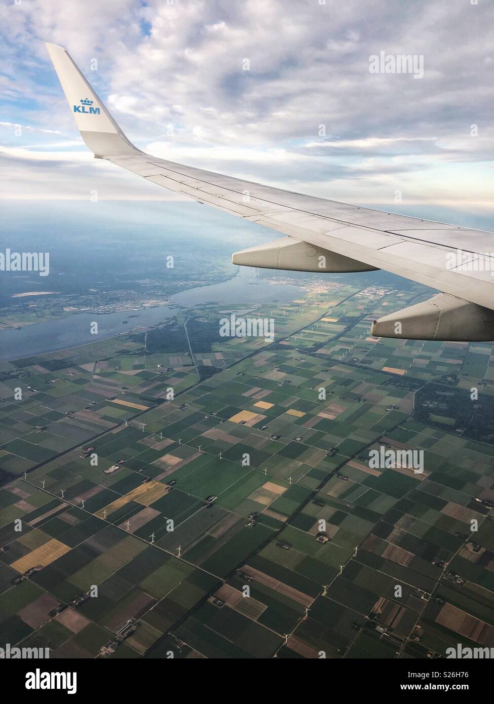 Flying over patches of farmland in northern Germany. Stock Photo