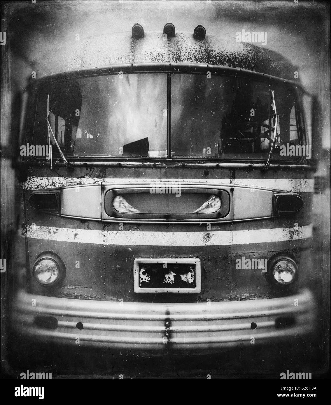 Front view of a rusty old abandoned bus - Smartphone Captured Stock Image