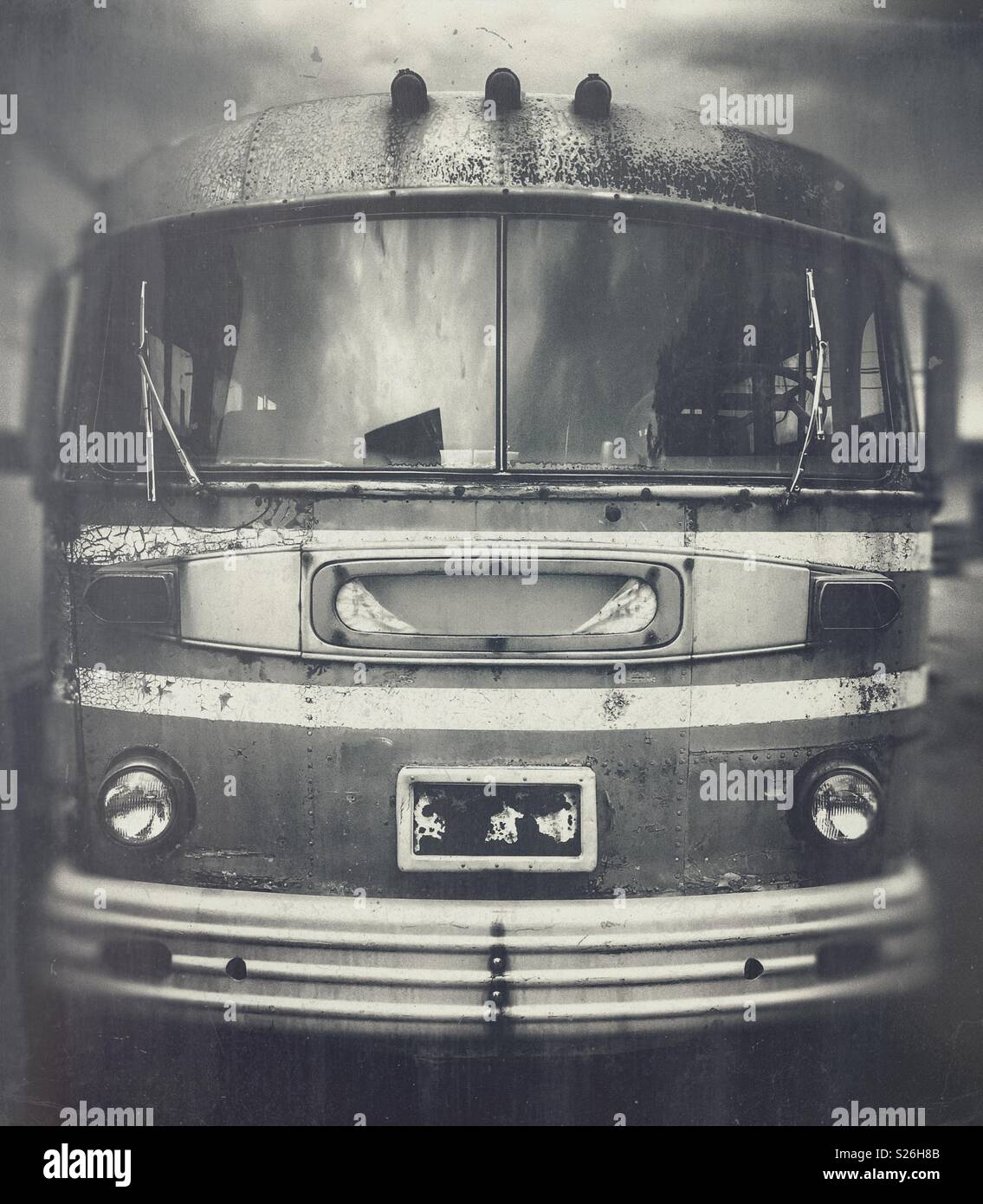 Front view of a rusty old abandoned bus - Smartphone Captured Stock Image