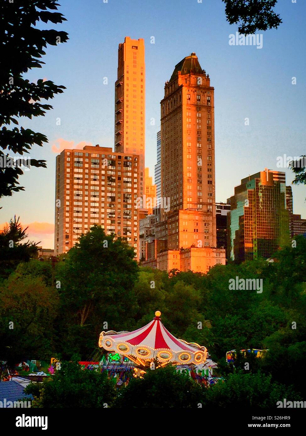 Victorian gardens Carnival is in the southern part of central park during the summer, NYC, USA - Smartphone Captured Stock Image