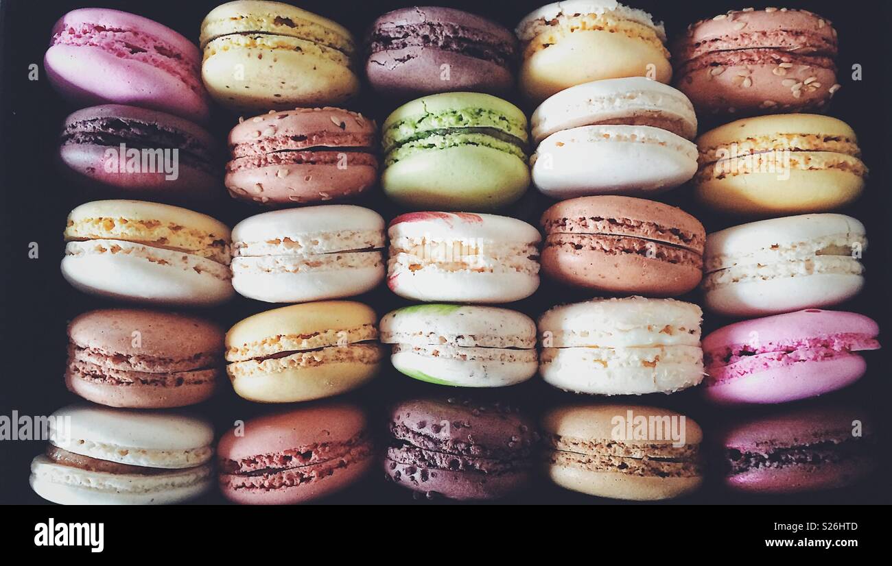 Macarons background. Colourful typical French pastry. Top view Stock Photo