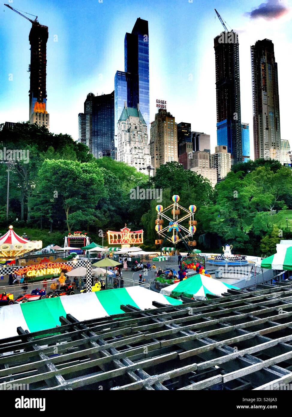 Victorian gardens carnival is an amusement park in the southern part of central park during the summer months, NYC, USA - Smartphone Captured Stock Image