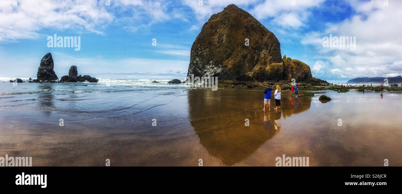 The Haystack Rock along the Oregon coast in Cannon Beach, United States. - Smartphone Captured Stock Image