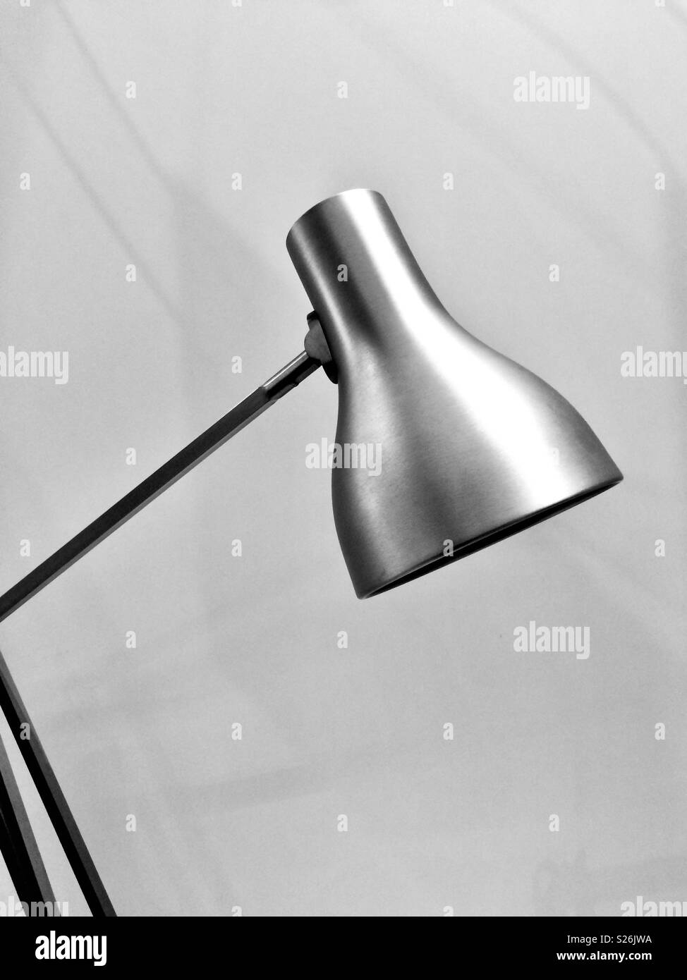 Anglepoise lamp in black and white - Smartphone Captured Stock Image