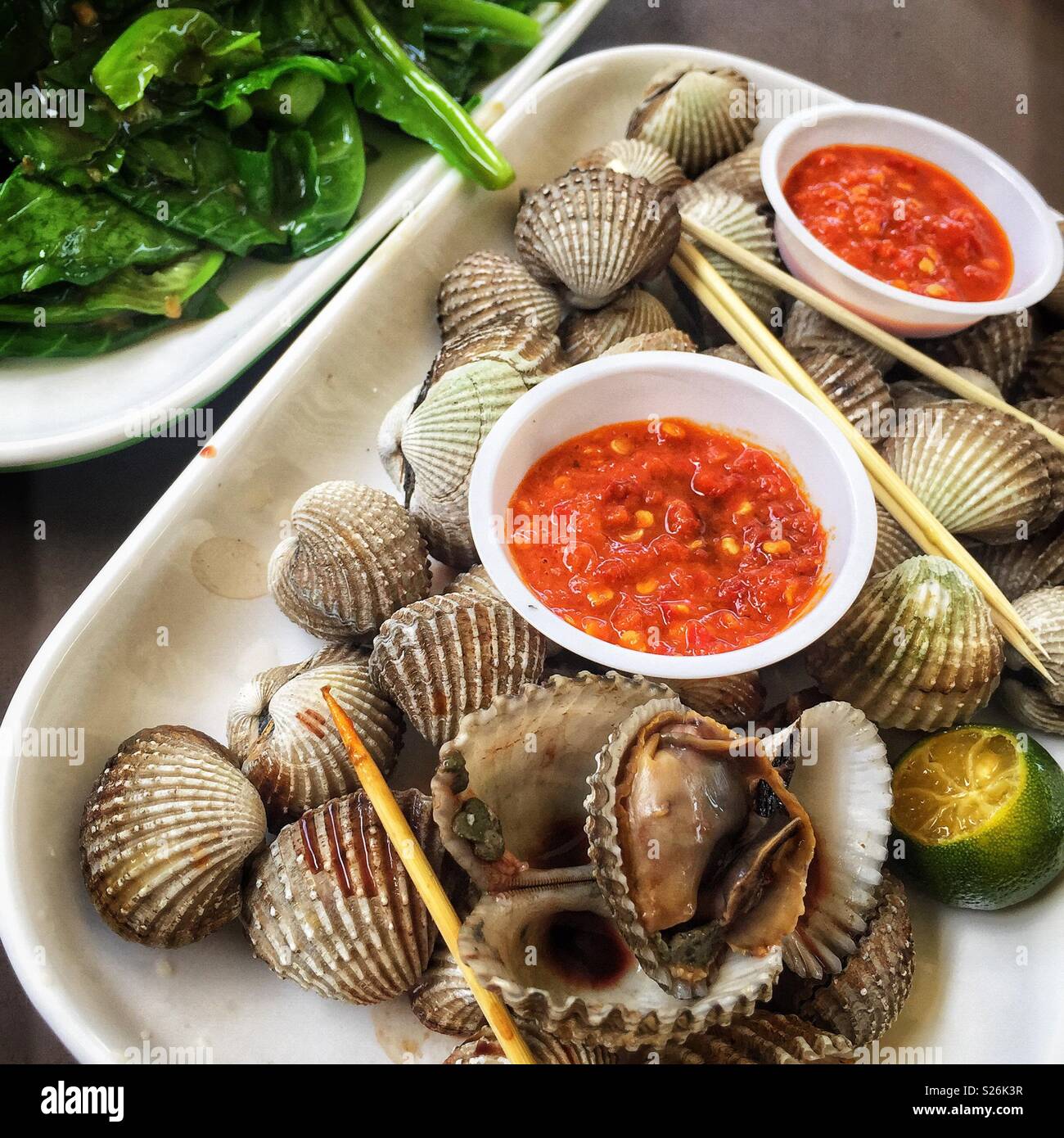 Clams and chilli sauce with gai lan and garlic at East Coast Lagoon