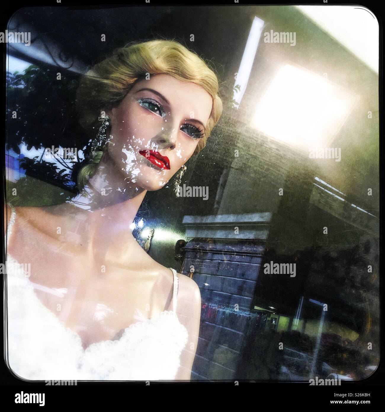 1960's style mannequin in a shop window, Kuala Lumpur, Malaysia - Smartphone Captured Stock Image