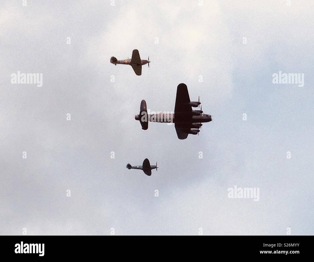 RAF Lancaster Bomber, Hurricane and Spitfire flying in formation. - Smartphone Captured Stock Image RAF Lancaster Bomber, Hurricane and Spitfire flying in formation. - Smartphone Captured Stock Image