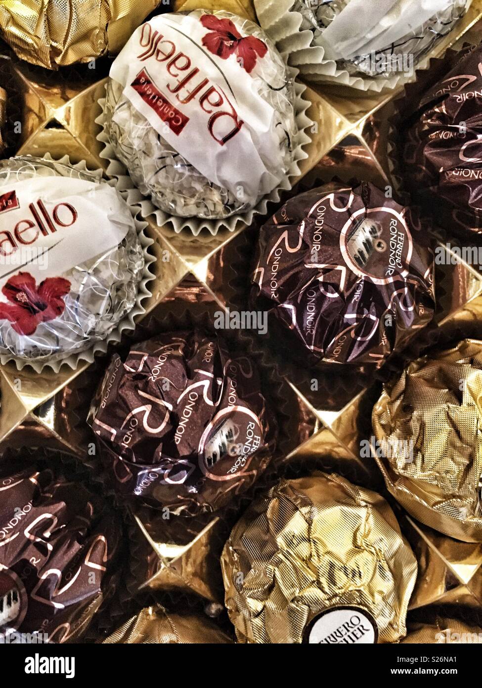 Ferrero Chocolate pralines collection box with Raffaello, Ferrero Rocher  and Rond noirs Stock Photo - Alamy