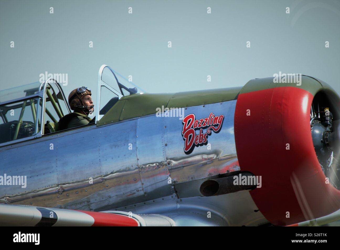 Pilot in dazzling debs plane Duxford Stock Photo