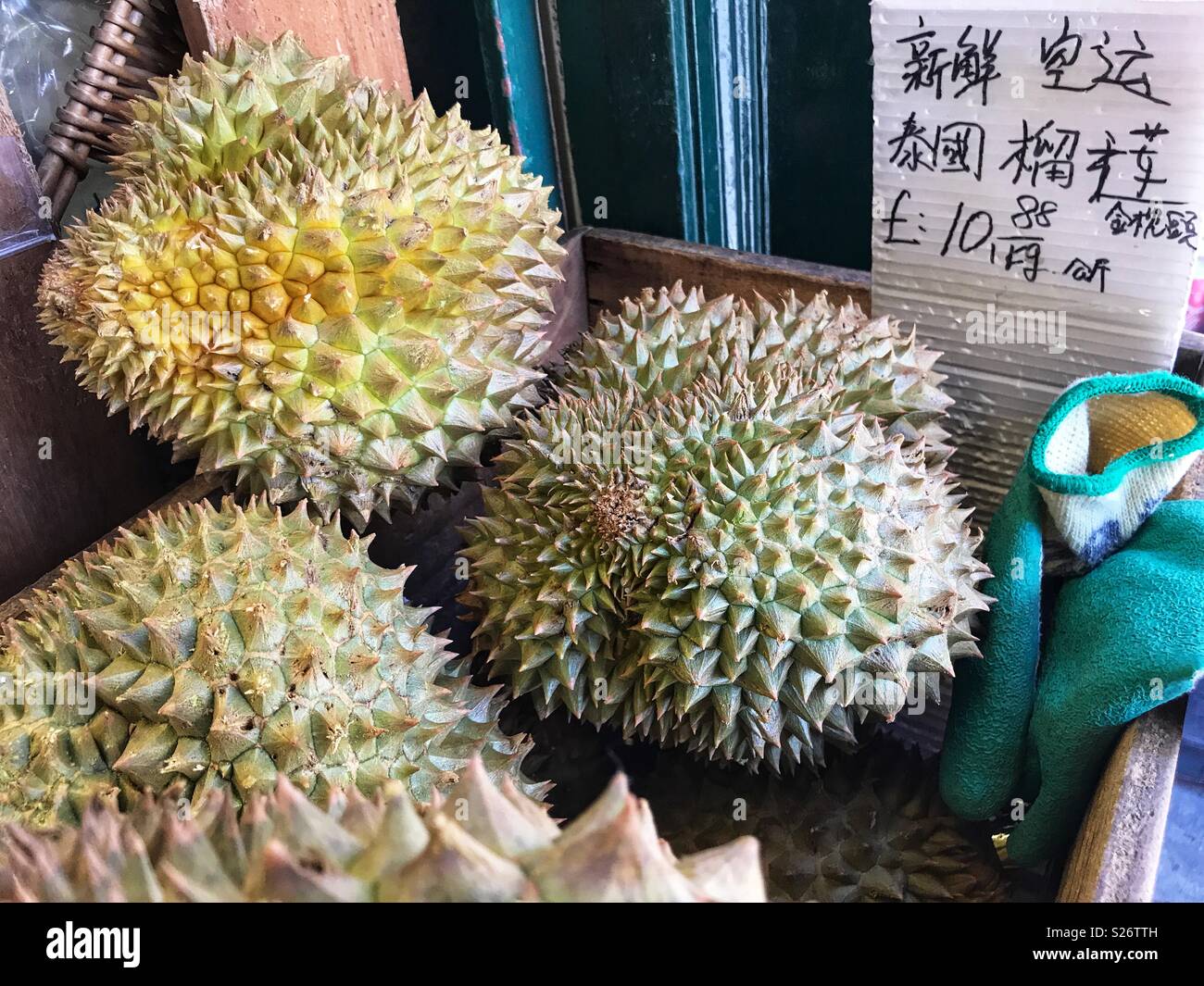 Durians for sale at a Chinese supermarket in Lisle Street, WC2, Chinatown, London, England Stock Photo