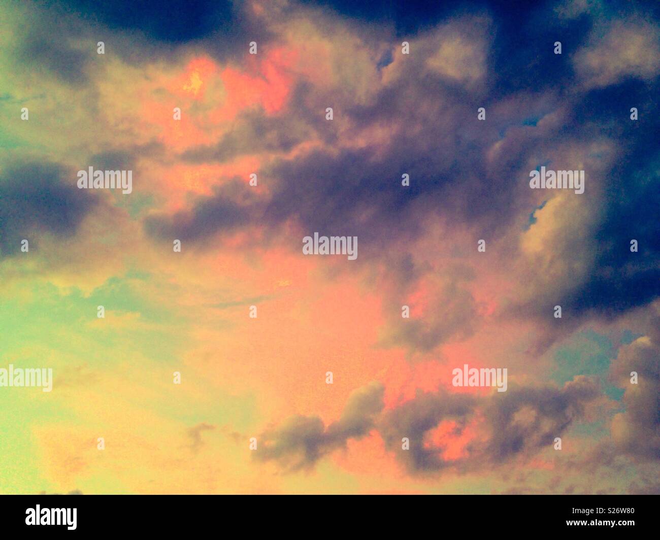 Mixture of pink and gray clouds in aqua sky Stock Photo