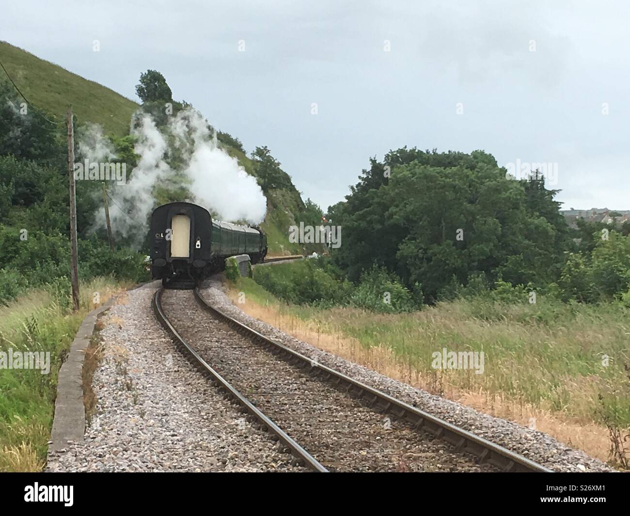 Steam train in English countryside Stock Photo