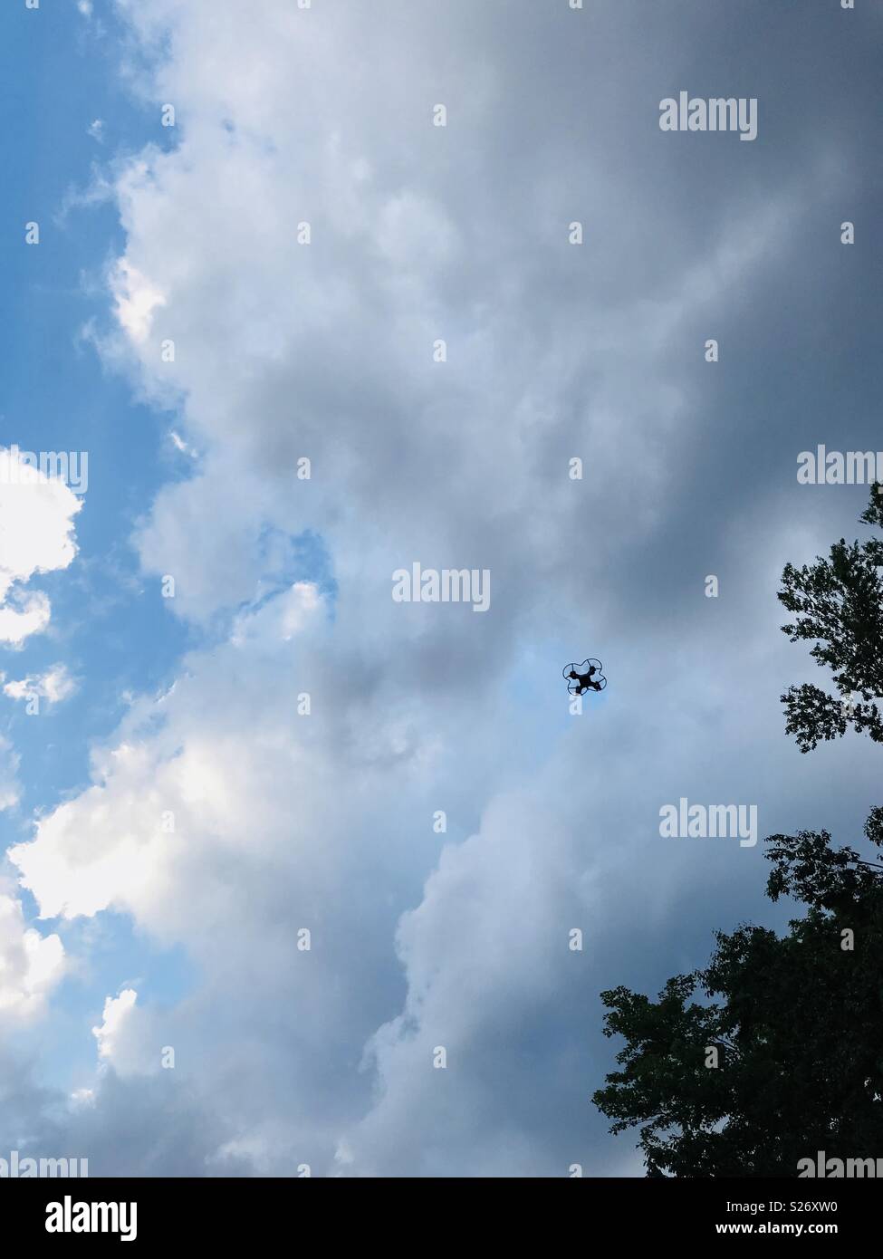 Flying a small drone Stock Photo