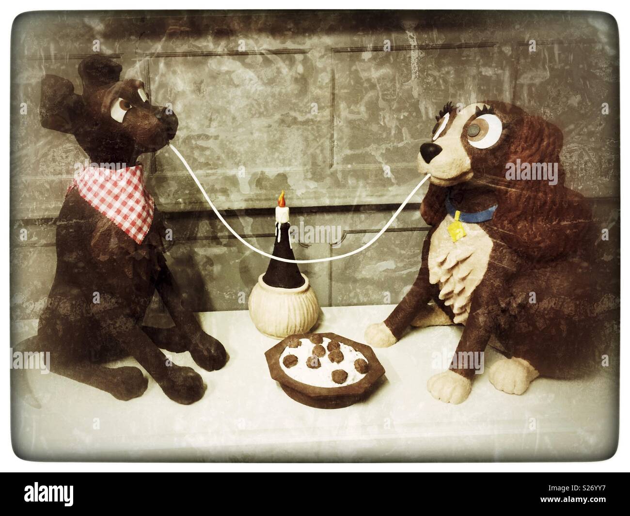 Lady and The Tramp entirely made of Chocolate on display at the Chocolate Factory in Bruges, Belgium. Stock Photo
