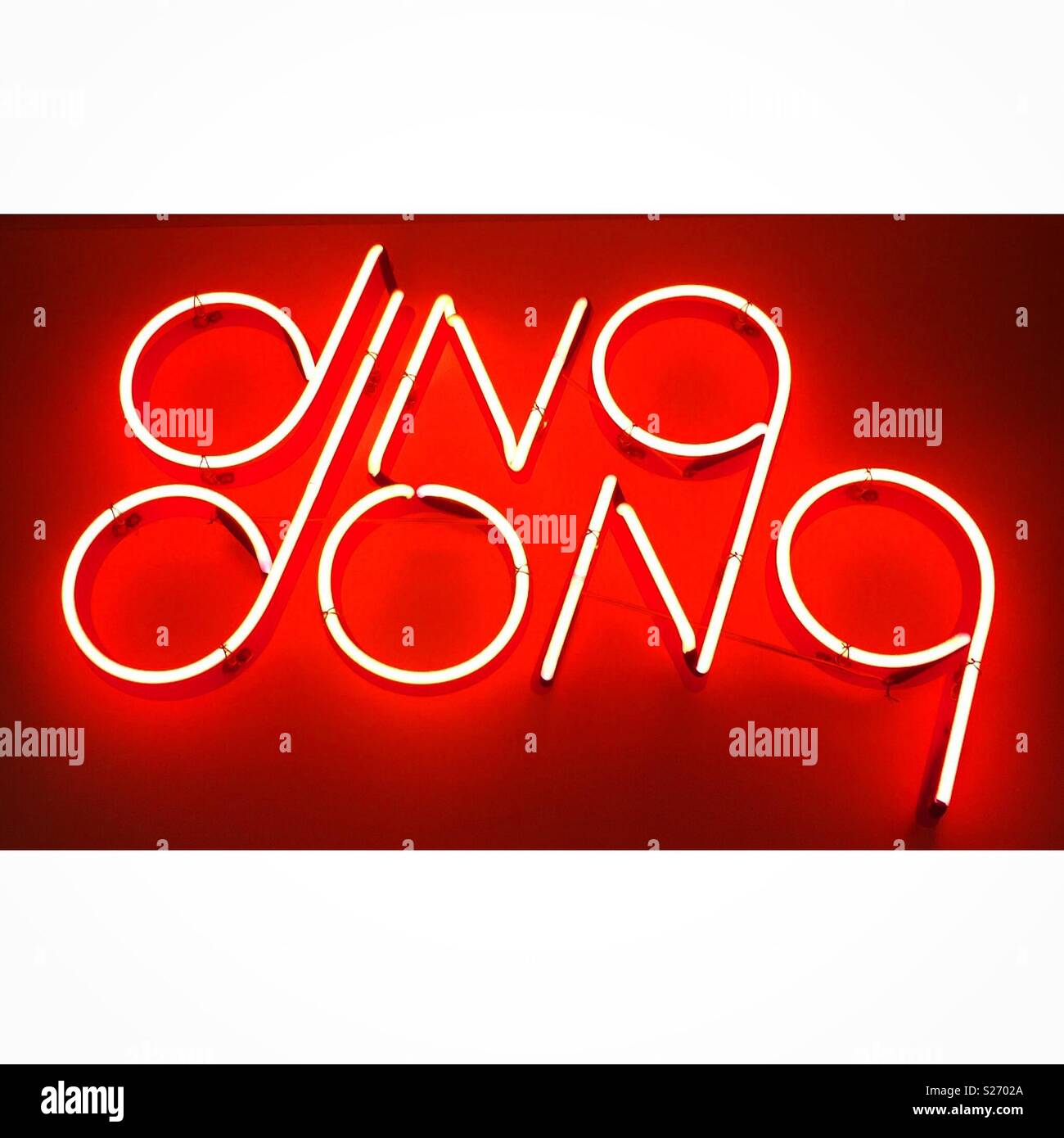 Ding dong Neon sign with red glow Stock Photo Alamy