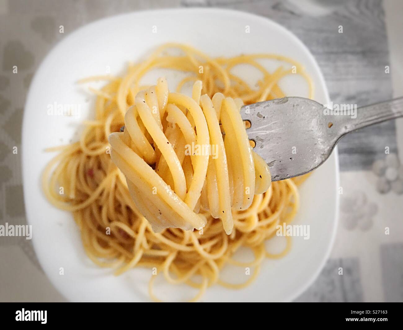 Eating spaghetti using a fork Stock Photo Alamy