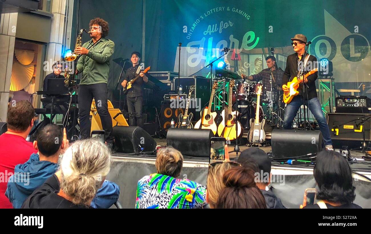 Jake Clemons performs at Toronto’s Jazz Festival. - Smartphone Captured Stock Image