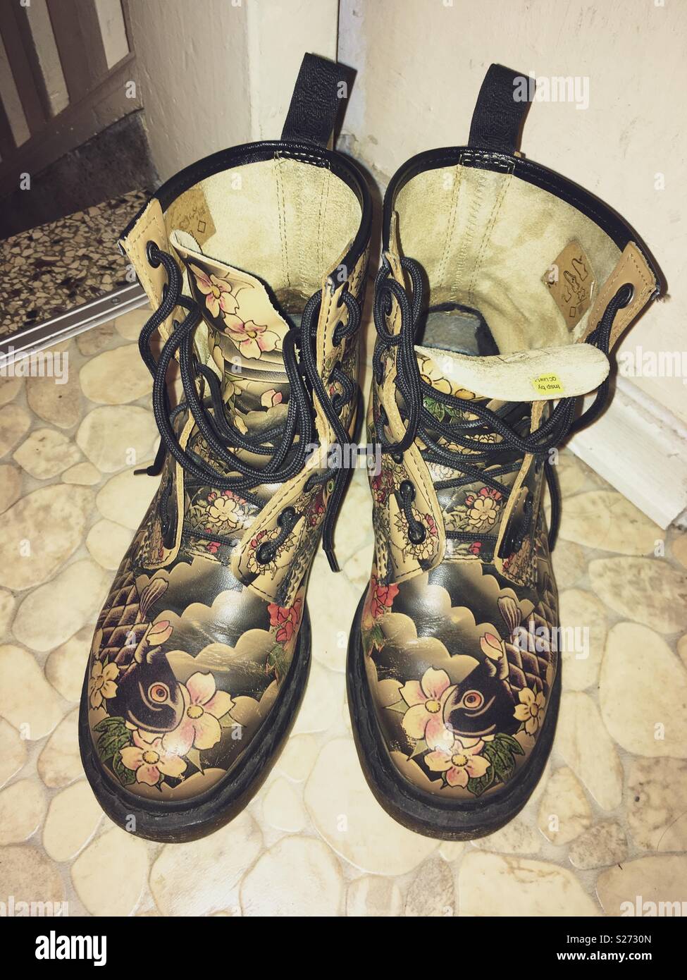 Dr. Martens boots with Japanese tattoo style print Stock Photo