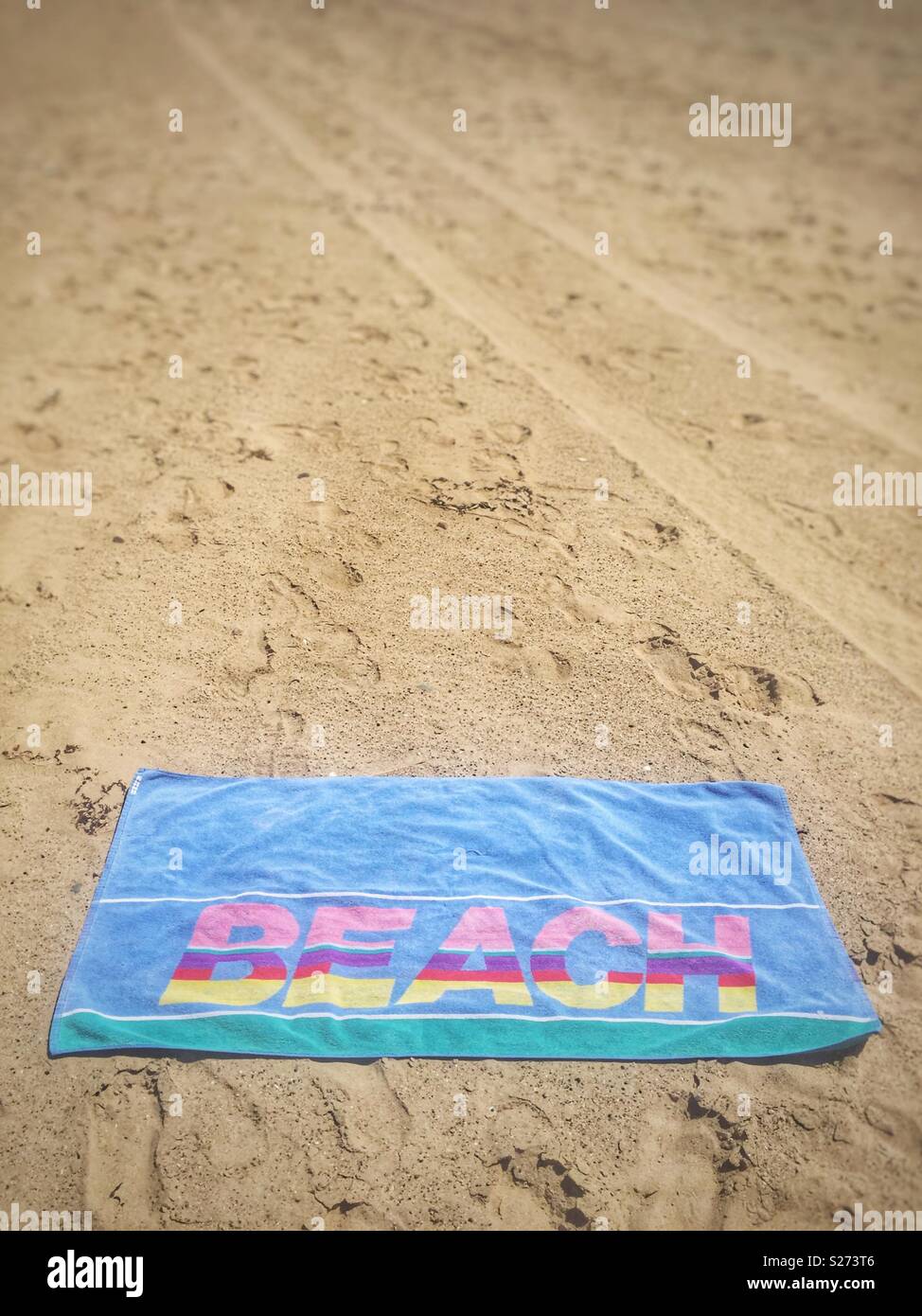 Beach towel on a beach Stock Photo Alamy