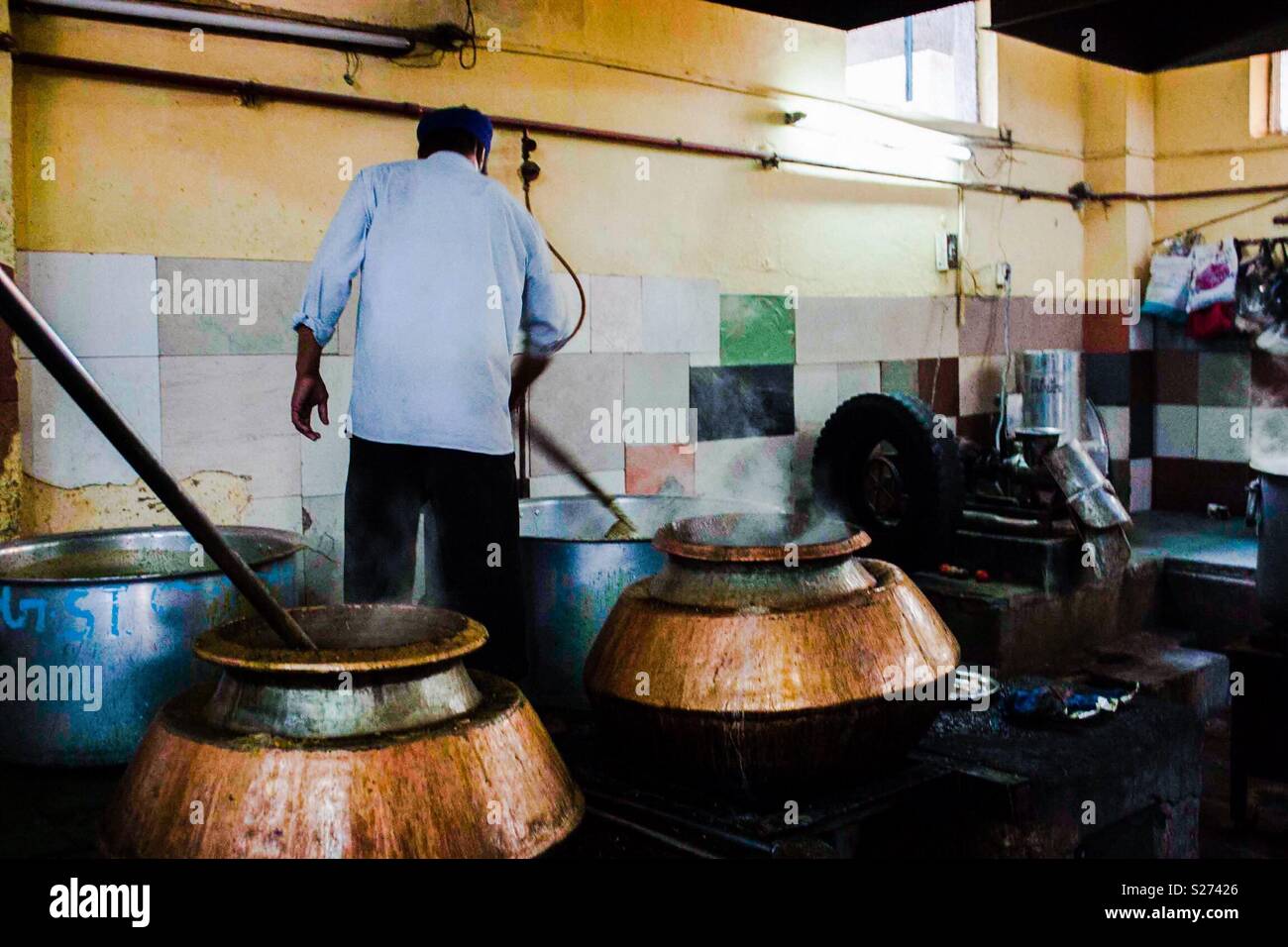 Gurdwara Sis Ganj sahib community kitchen, Chandni chowk, Delhi - Smartphone Captured Stock Image