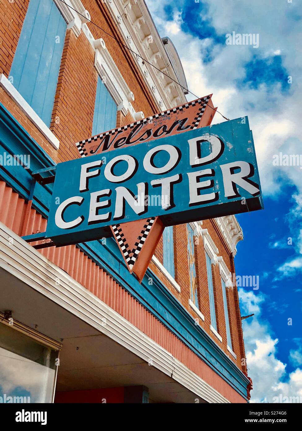 Old retro sign for Nelson food center in Nebraska. Now closed down