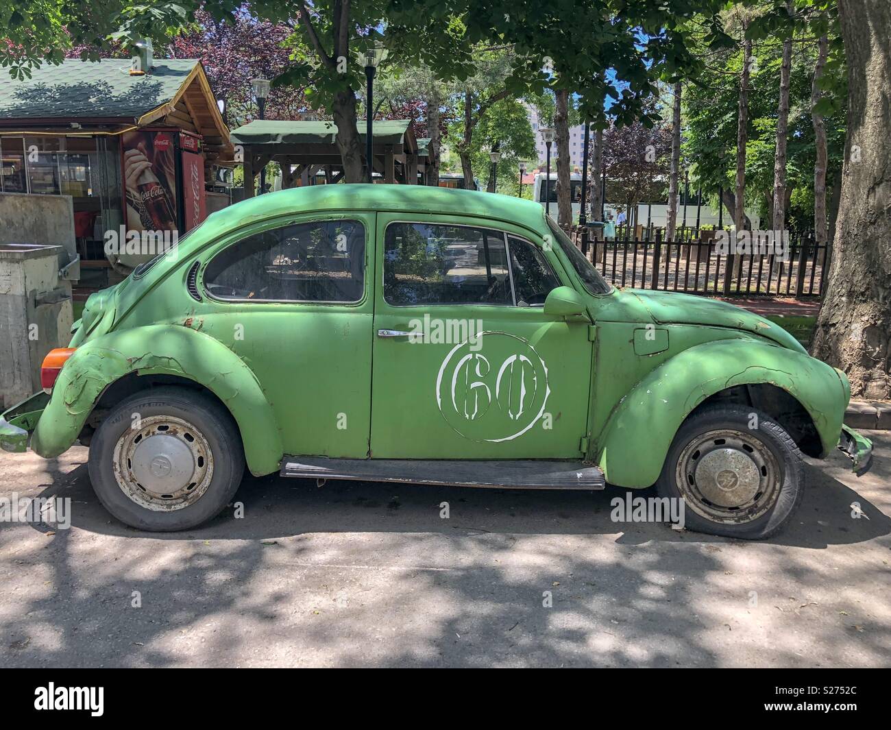 Old green Volkswagen Beetle Stock Photo