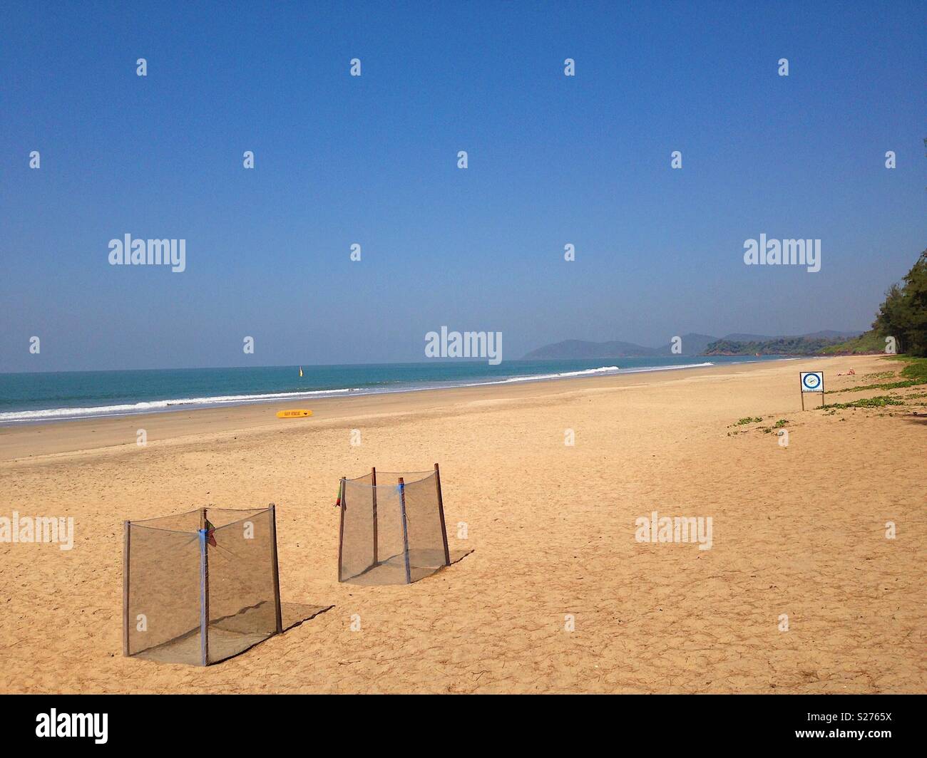 Protected turtle nesting sites on empty beach Stock Photo