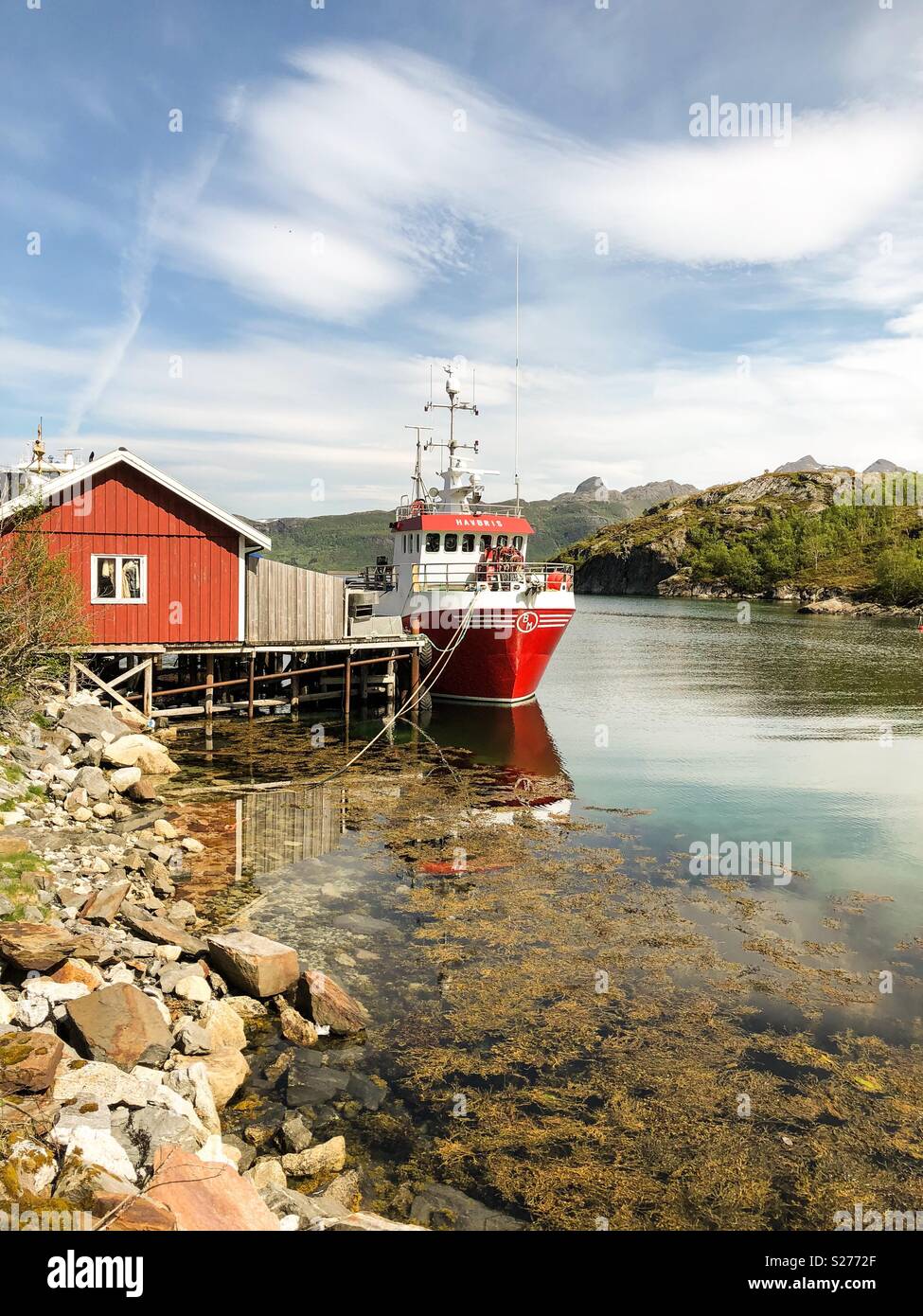 Docked fishing boat in a fjord in Norway - Smartphone Captured Stock Image