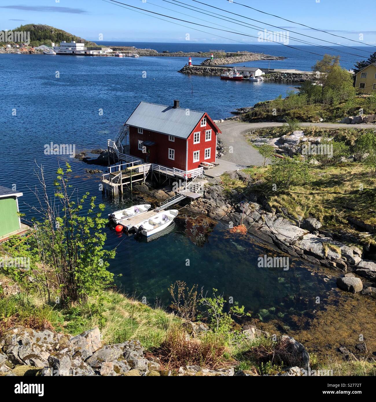 House by a fjord in Lofoten Islands Norway Stock Photo
