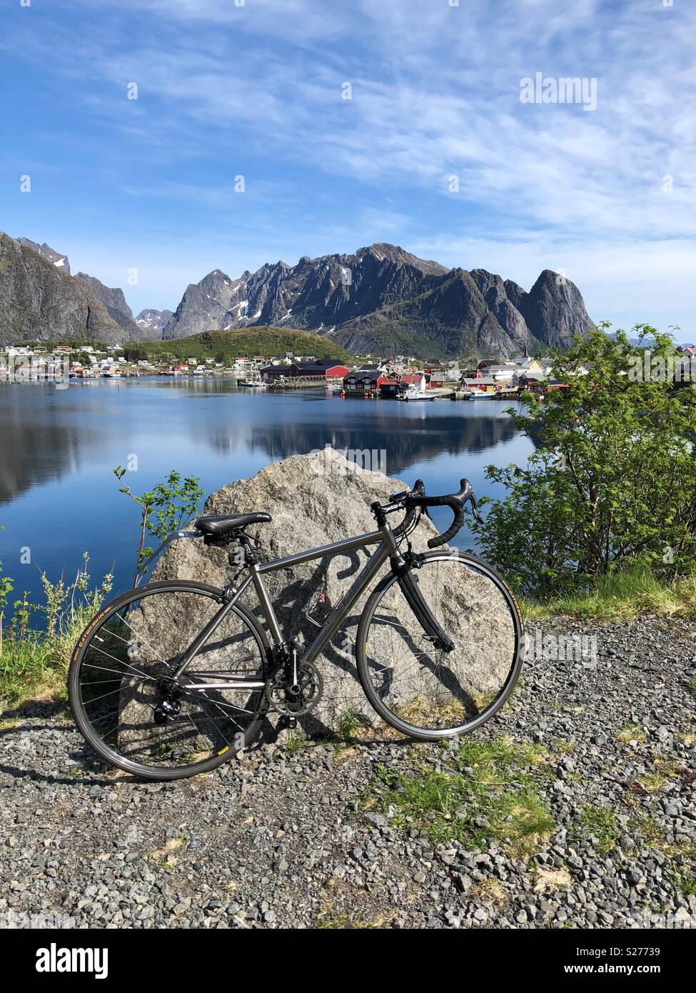 Lofoten Islands Norway. Reine fishing village with bike - Smartphone Captured Stock Image