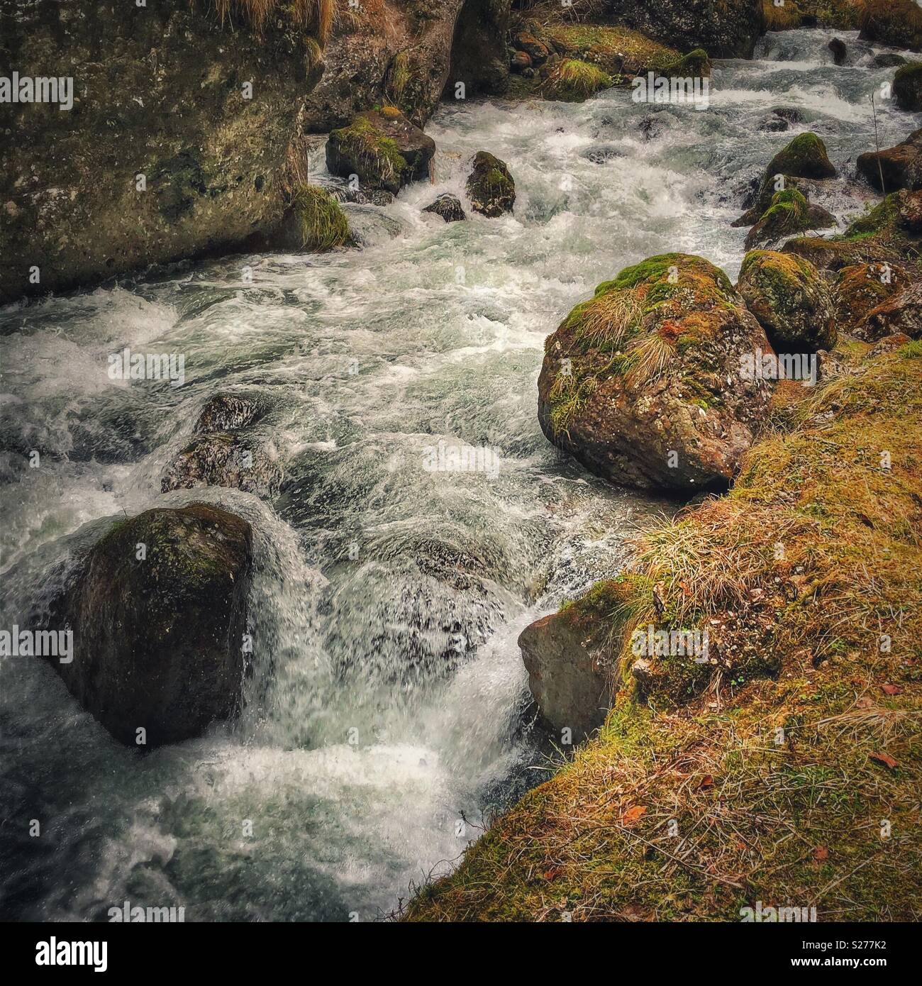 Mountain stream flowing over rocks - Smartphone Captured Stock Image
