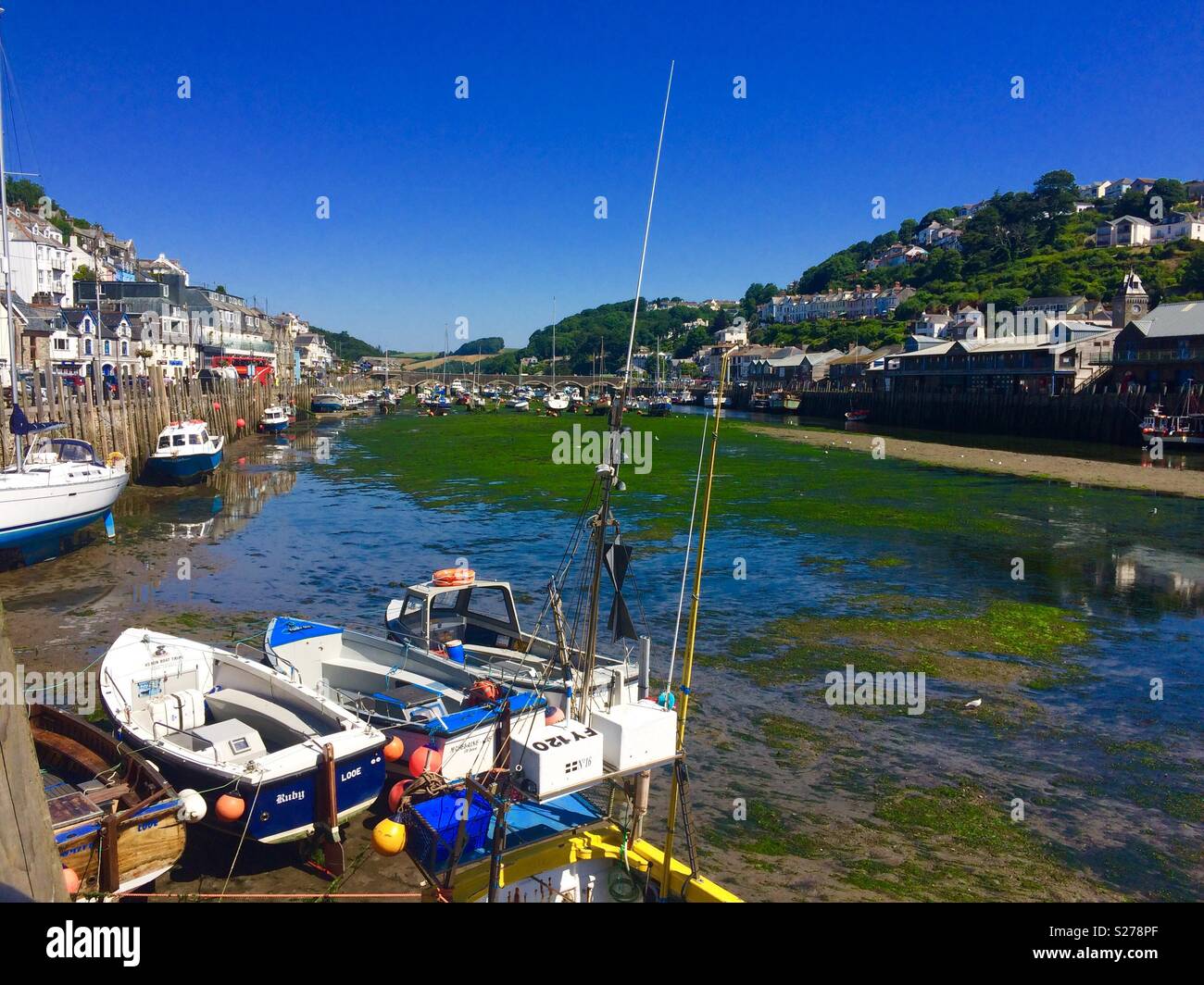 Boats in Looe harbour in summer time Stock Photo Alamy