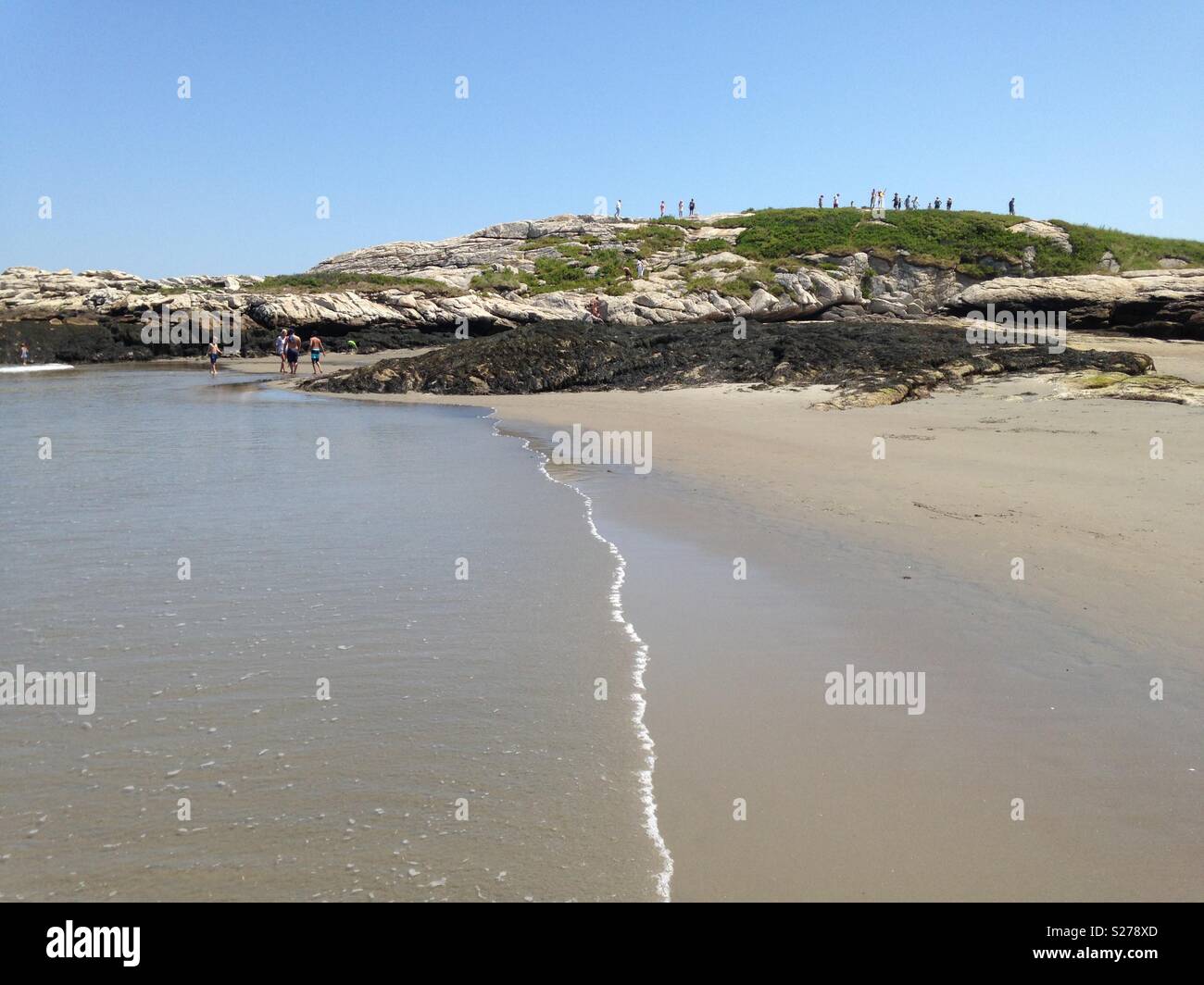 Gentle waves along the sands of the beach - Smartphone Captured Stock Image