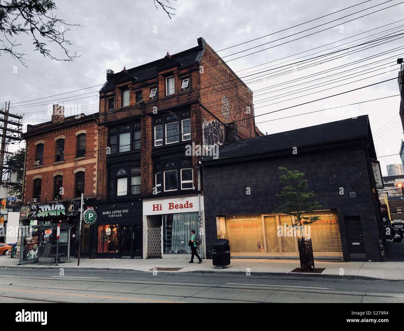 A street In Toronto with red brick buildings late afternoon light - Smartphone Captured Stock Image