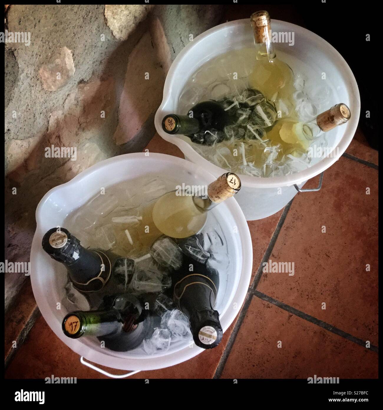 Wine cooling in ice buckets, Catalonia, Spain. - Smartphone Captured Stock Image