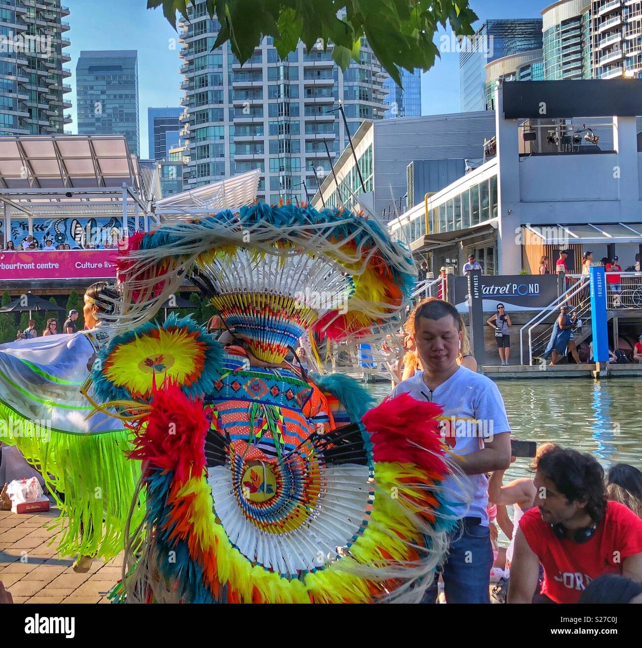 A First Nation dancer at Canada Day celebrations, Toronto Harbourfront Centre. - Smartphone Captured Stock Image