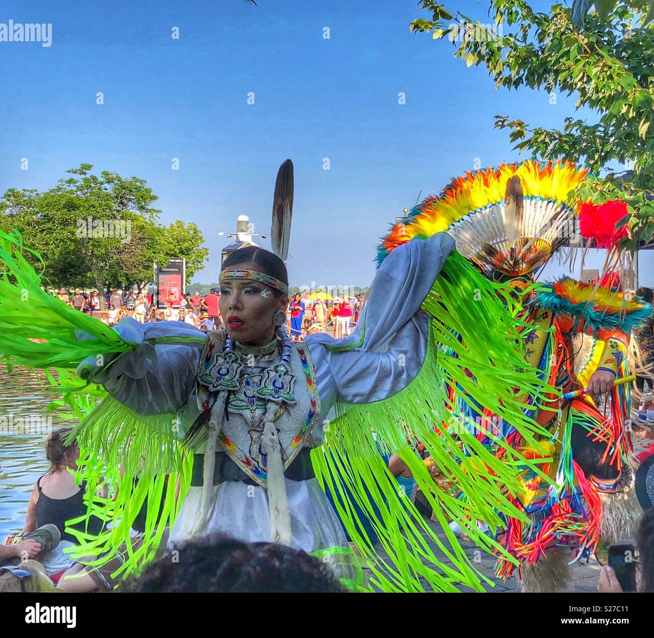 Female indigenous dancer taking part in Canada Day celebrations at Harbourfront Centre in Toronto. - Smartphone Captured Stock Image
