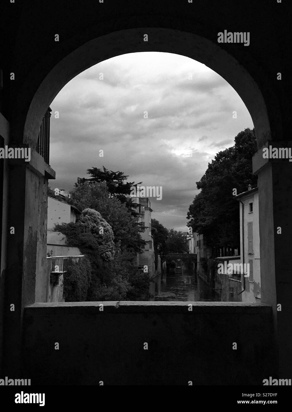 Window on the river. Mantua, Italy. - Smartphone Captured Stock Image