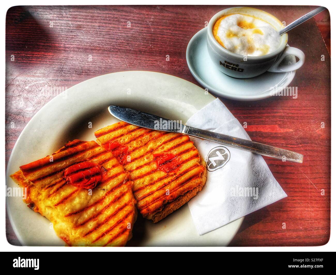 Cafe Nero mozzarella cheese and tomato toasted sandwich - Smartphone Captured Stock Image