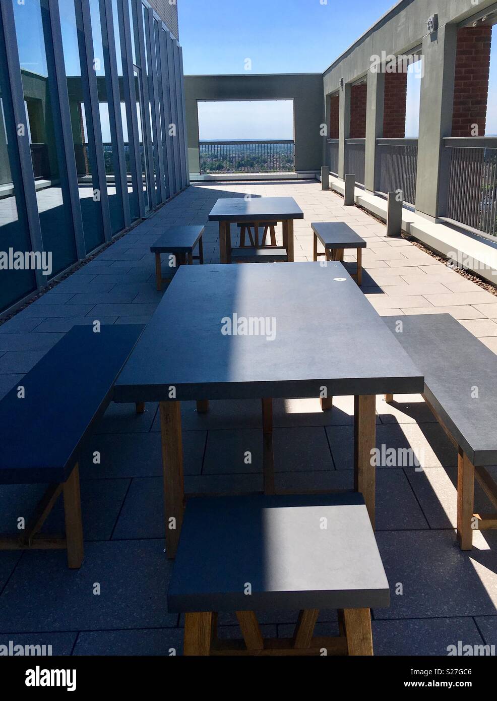Outdoor meeting room on the roof of Friargate, a contemporary office building, built of brick, steel and glass. In Coventry’s new business district. City of Culture 2021. - Smartphone Captured Stock Image