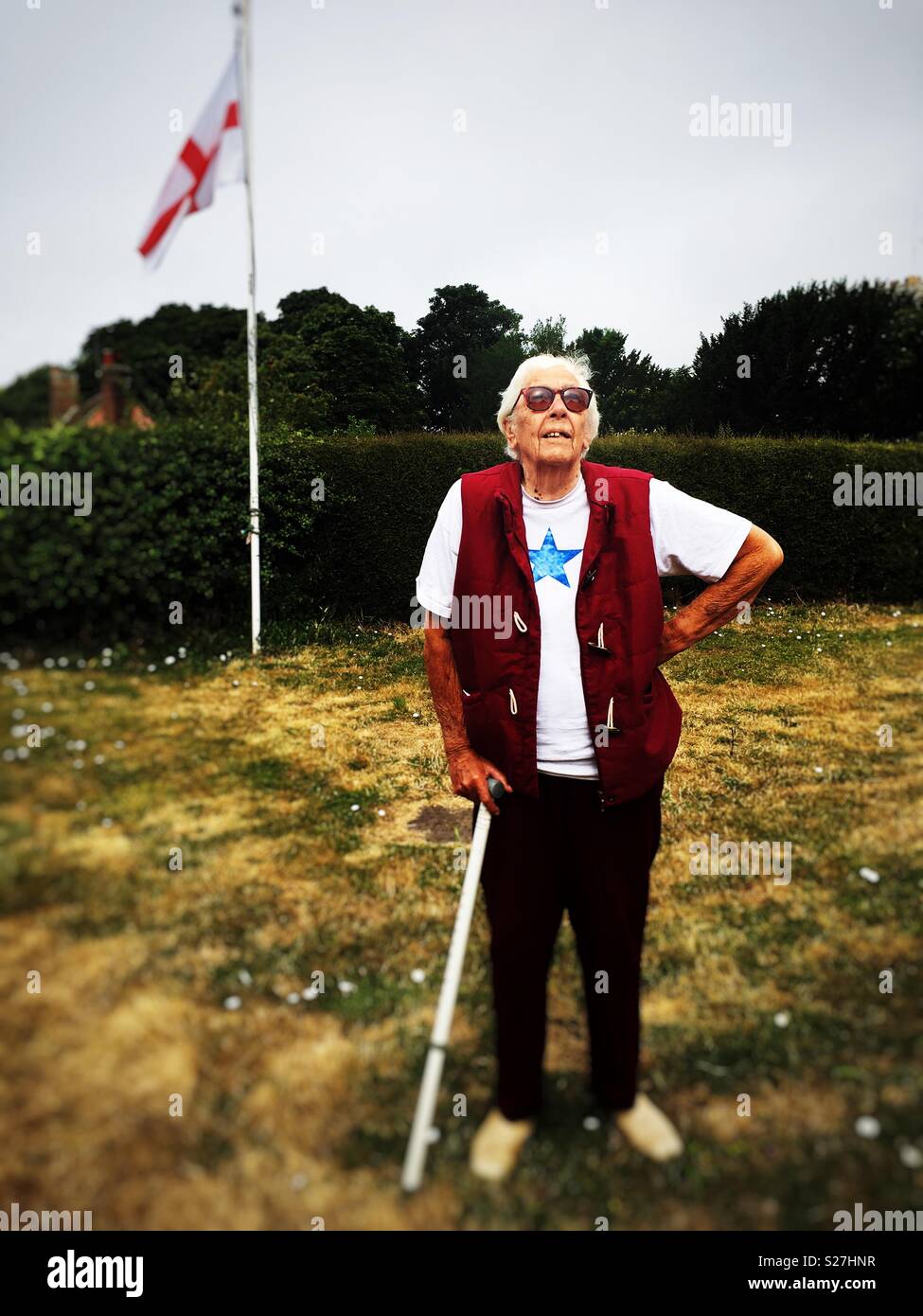 Elderly woman suffering from macular degeneration in her eyes - Smartphone Captured Stock Image