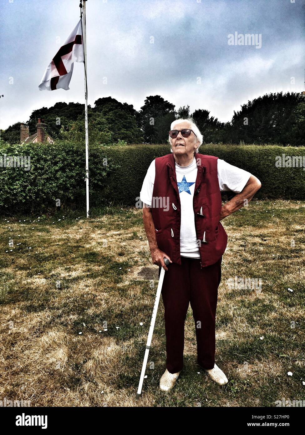 Elderly woman suffering from macular degeneration in her eyes - Smartphone Captured Stock Image