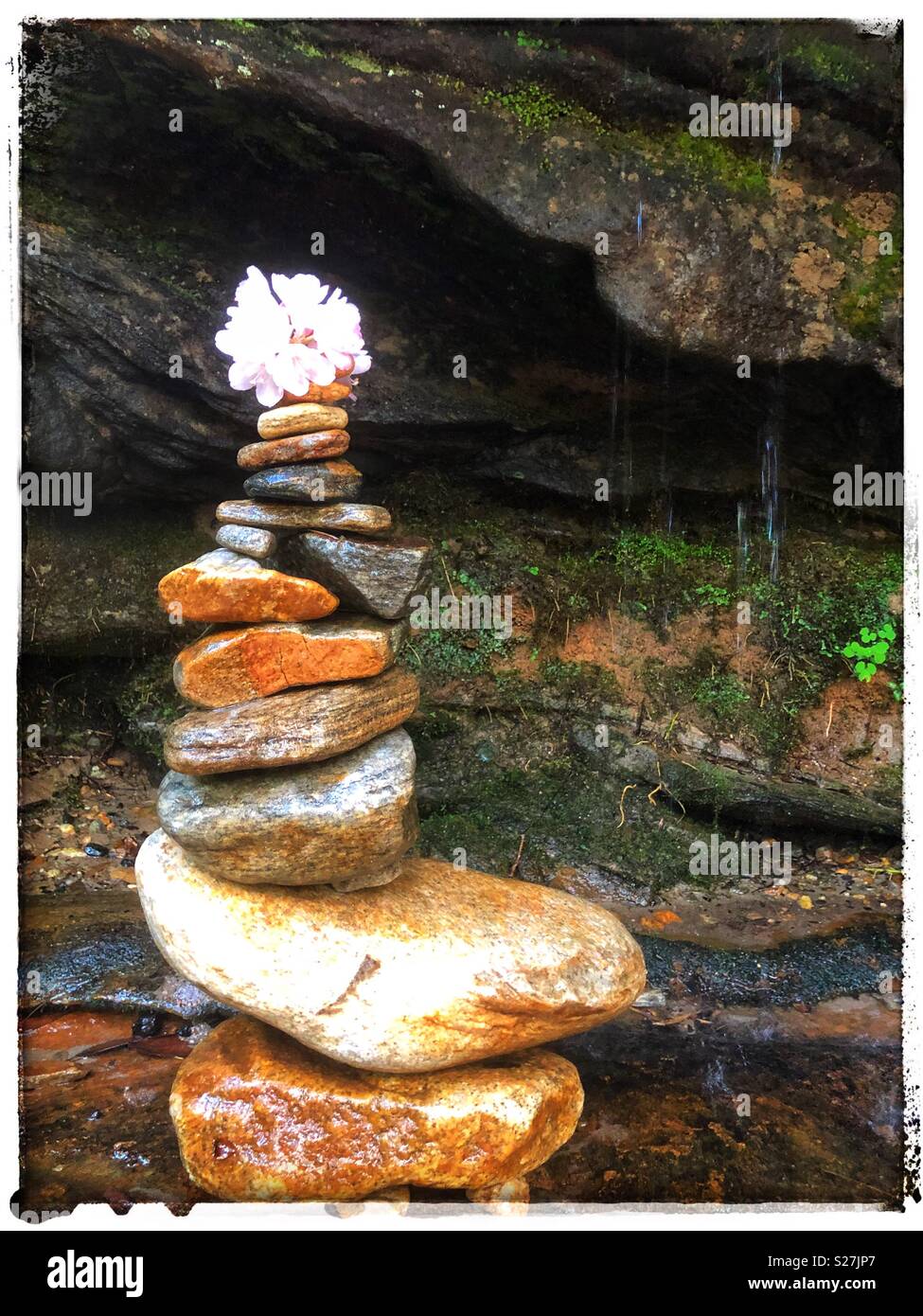 Stacked rocks under a waterfall hires stock photography and images Alamy
