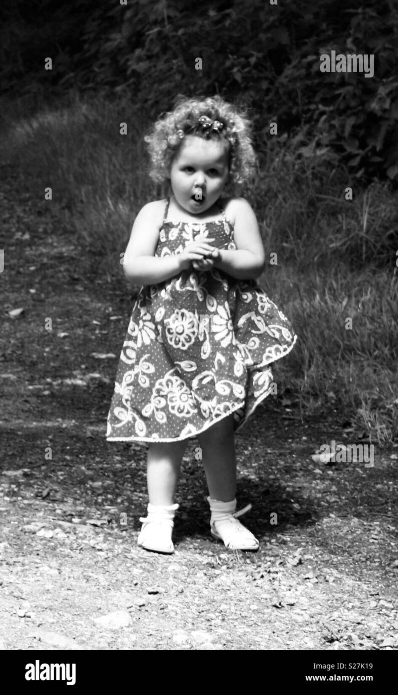 Little girl white curly hair Black and White Stock Photos & Images - Alamy