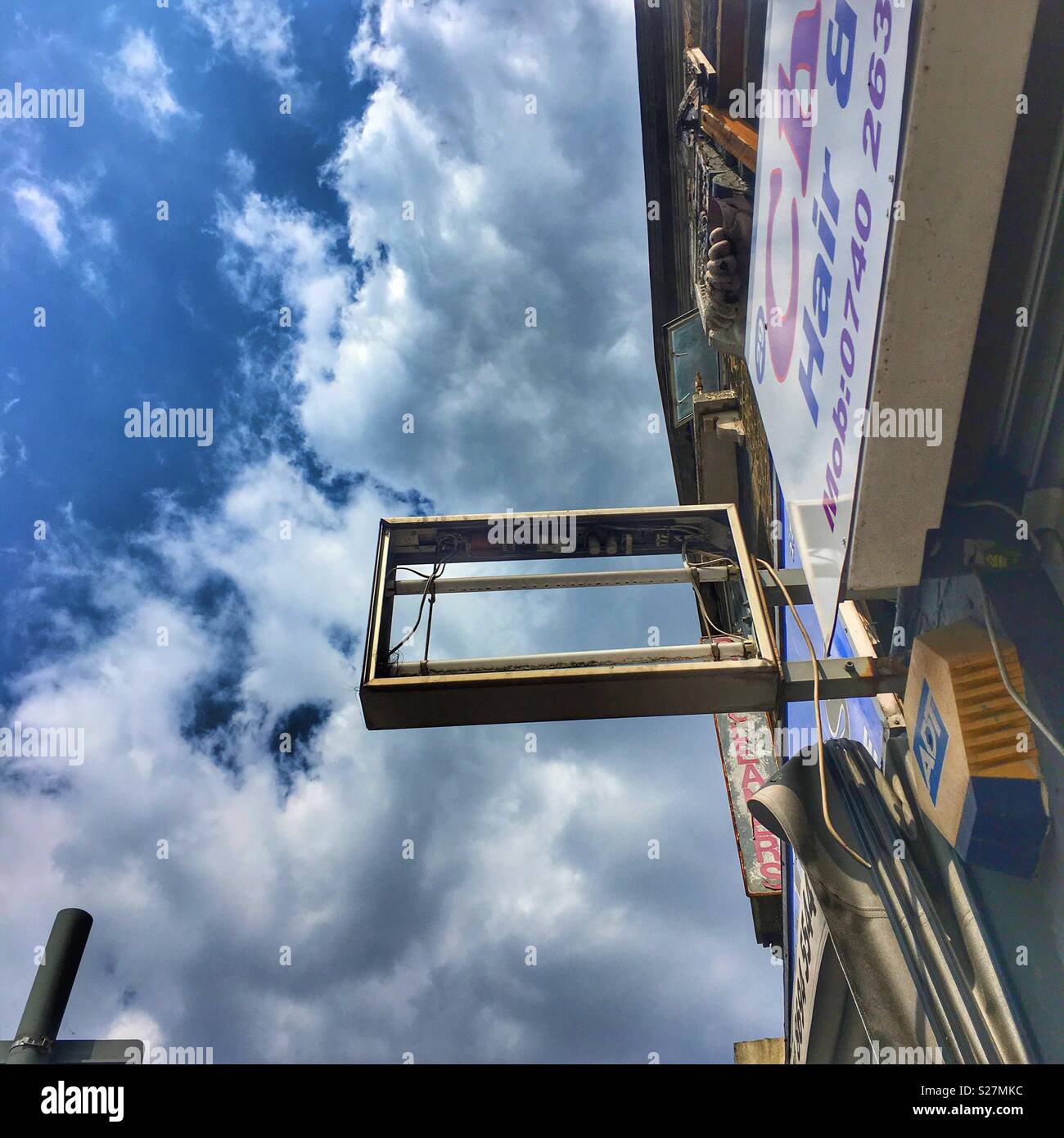 Old shop sign Stock Photo - Alamy
