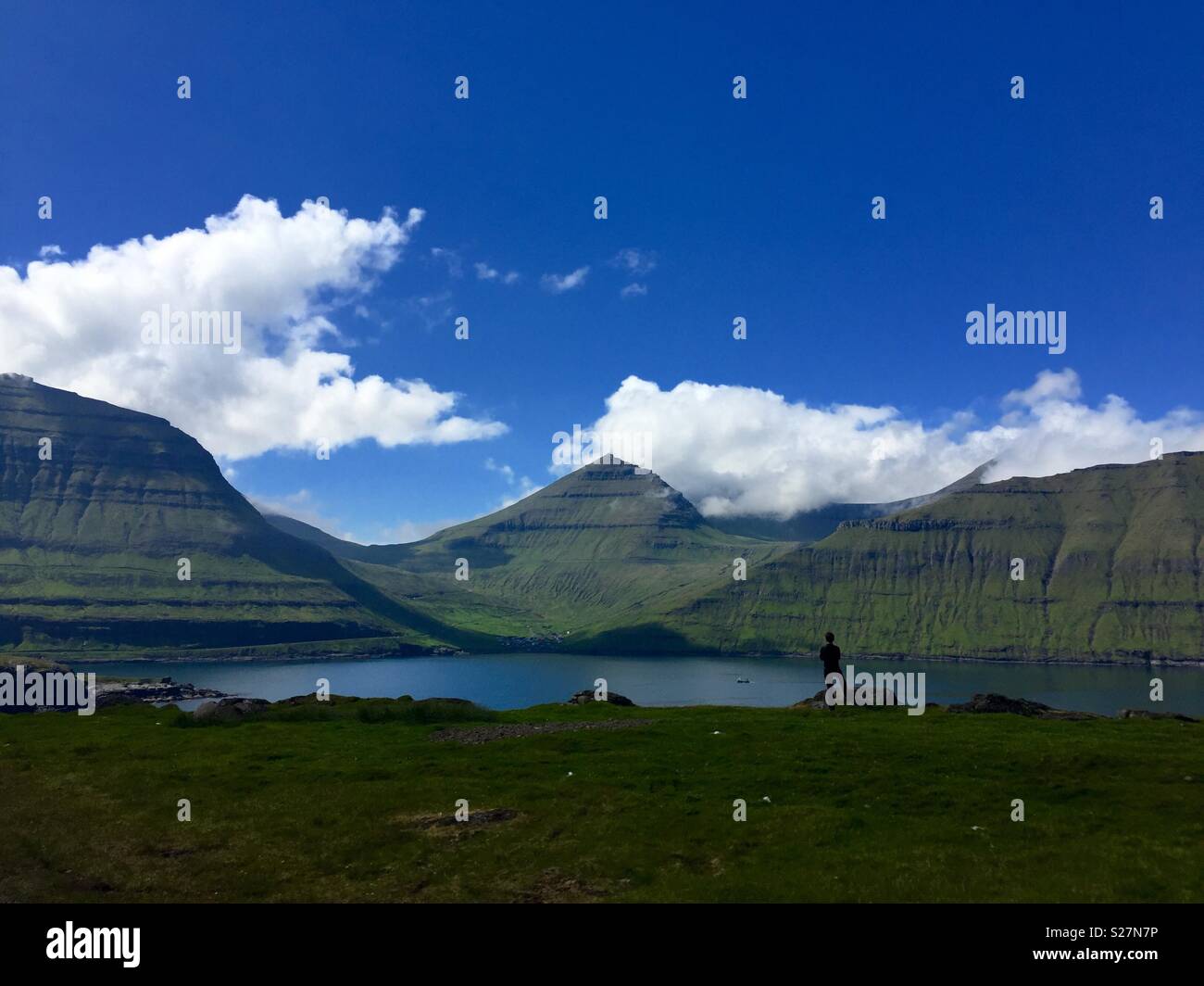 Funningur from across the fjord, Faroe Islands Stock Photo