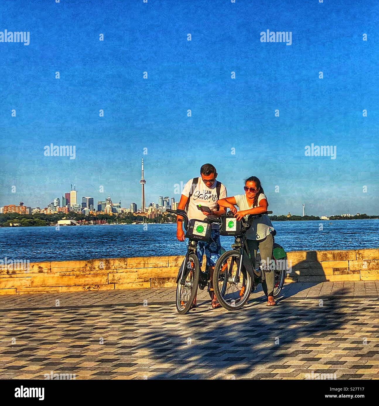 Tourists on bicycles in Toronto, Ontario. - Smartphone Captured Stock Image
